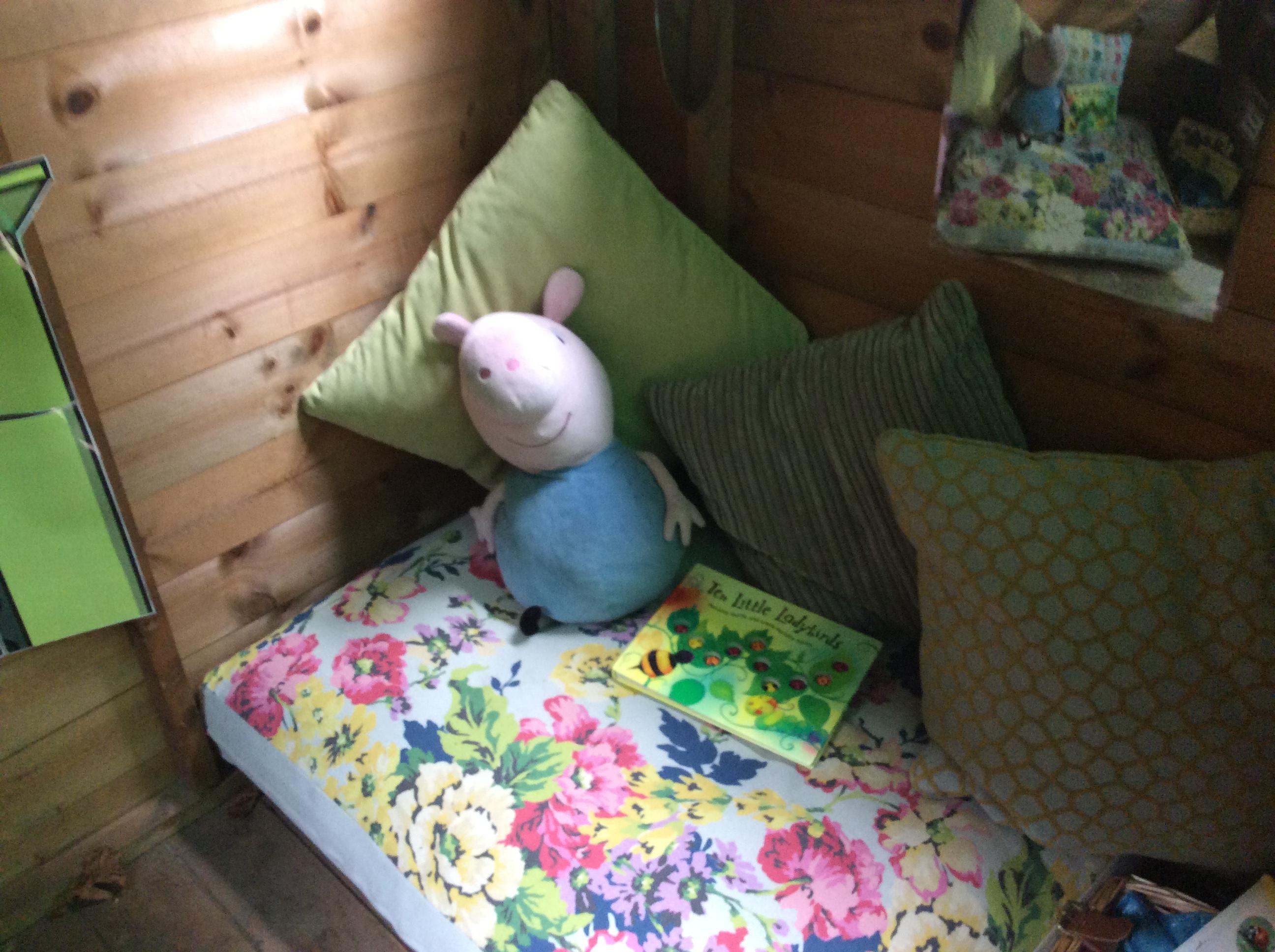 Piglet is ready to read in our EYFS outdoor area